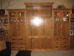 A large medium colored wooden entertainment center